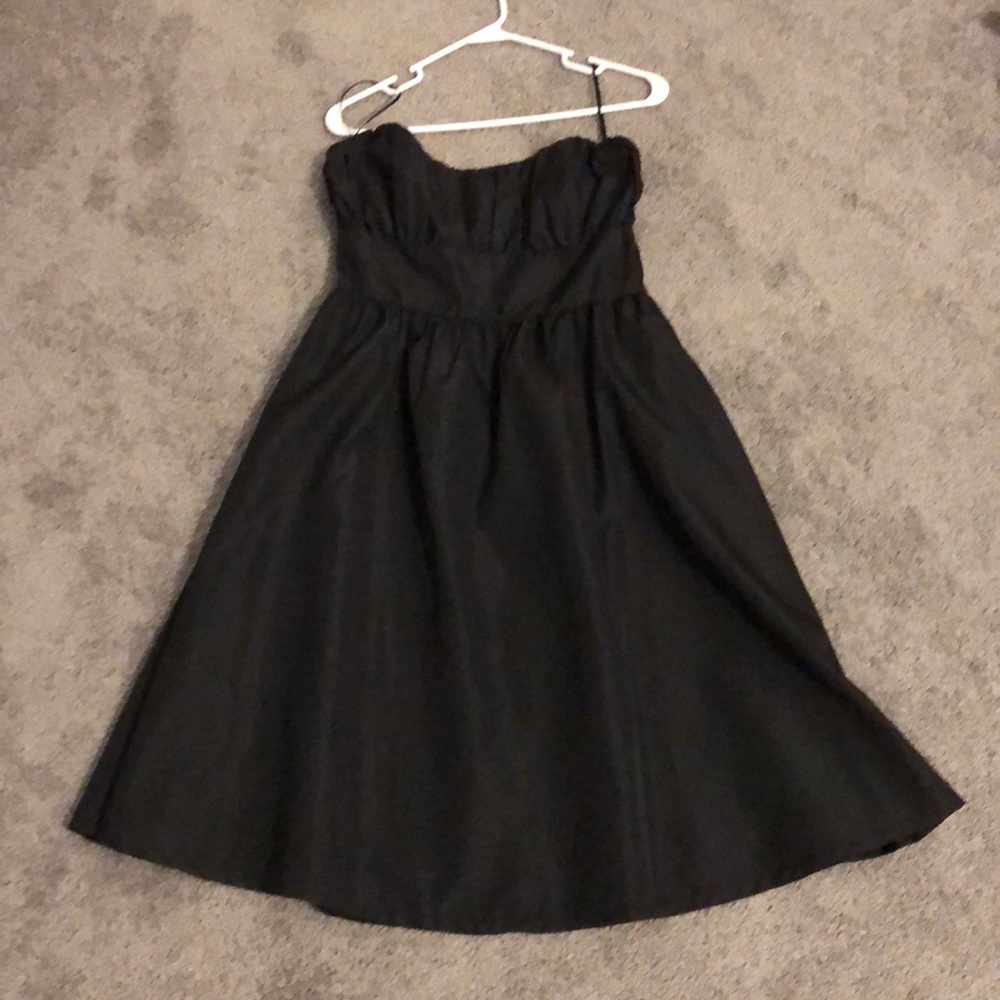 Delia’s satin -like formal black strapless dress